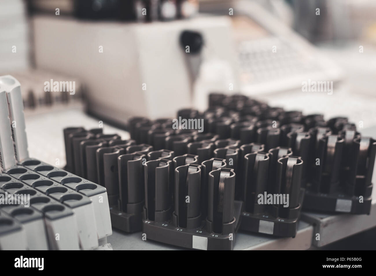 Test tube holders on laboratory table Stock Photo Alamy