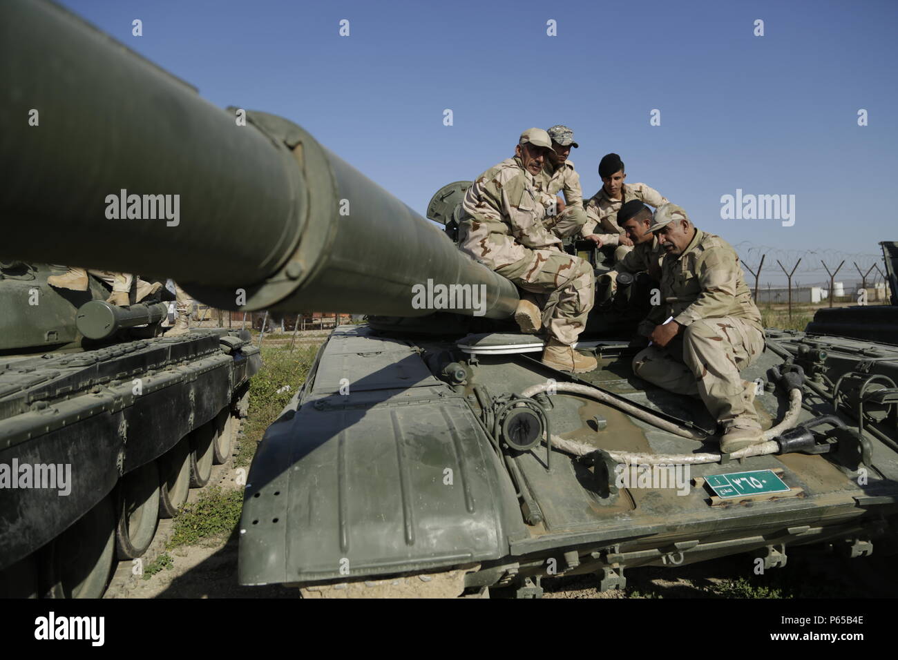 Iraqi Soldiers With 2nd Battalion 35th Iraqi Army Brigade Listen To T 72 Tank Driver S Compartment Instruction During Familiarization Training At The Besmaya Range Complex Iraq April 5 16 Tank Familiarization Is The