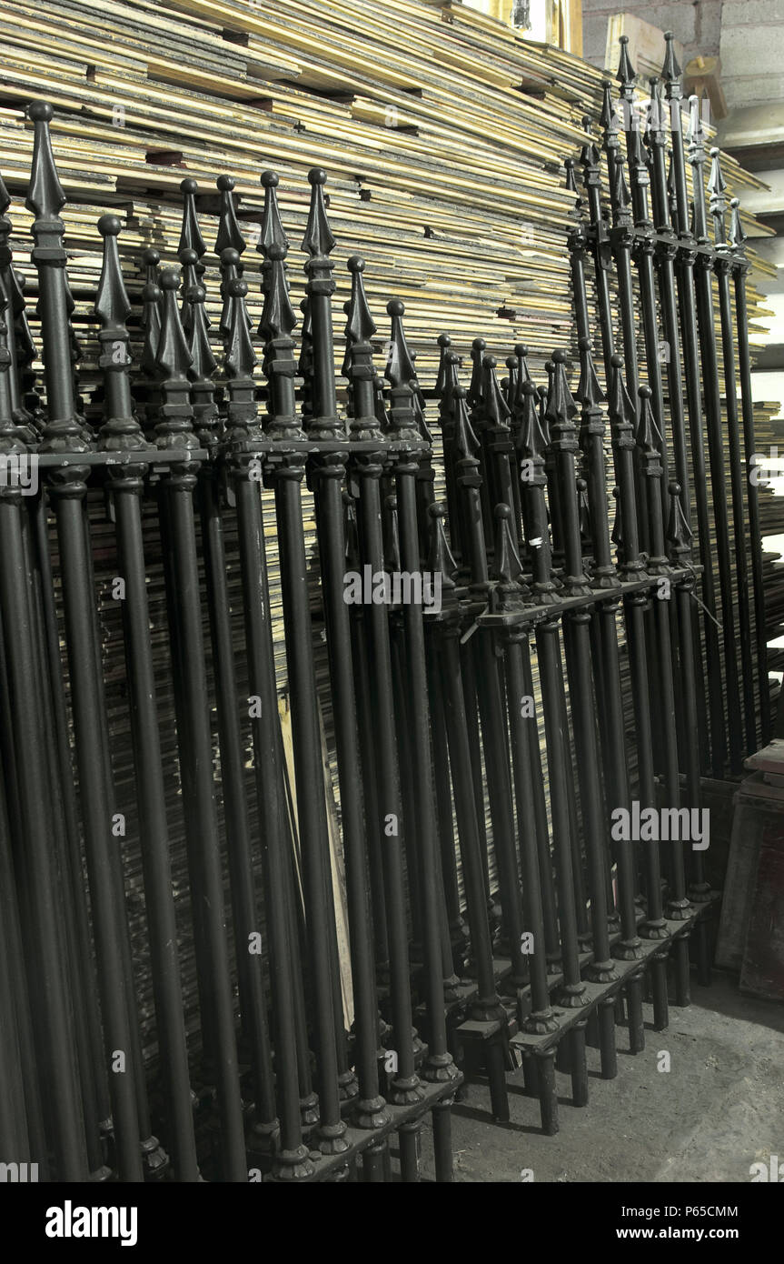 Wrought iron gates in salvage yard Stock Photo Alamy