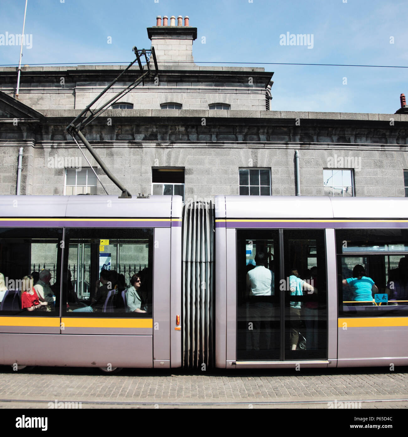 LUAS tram at Four Courts stop on the Red Line Dublin Ireland 2008