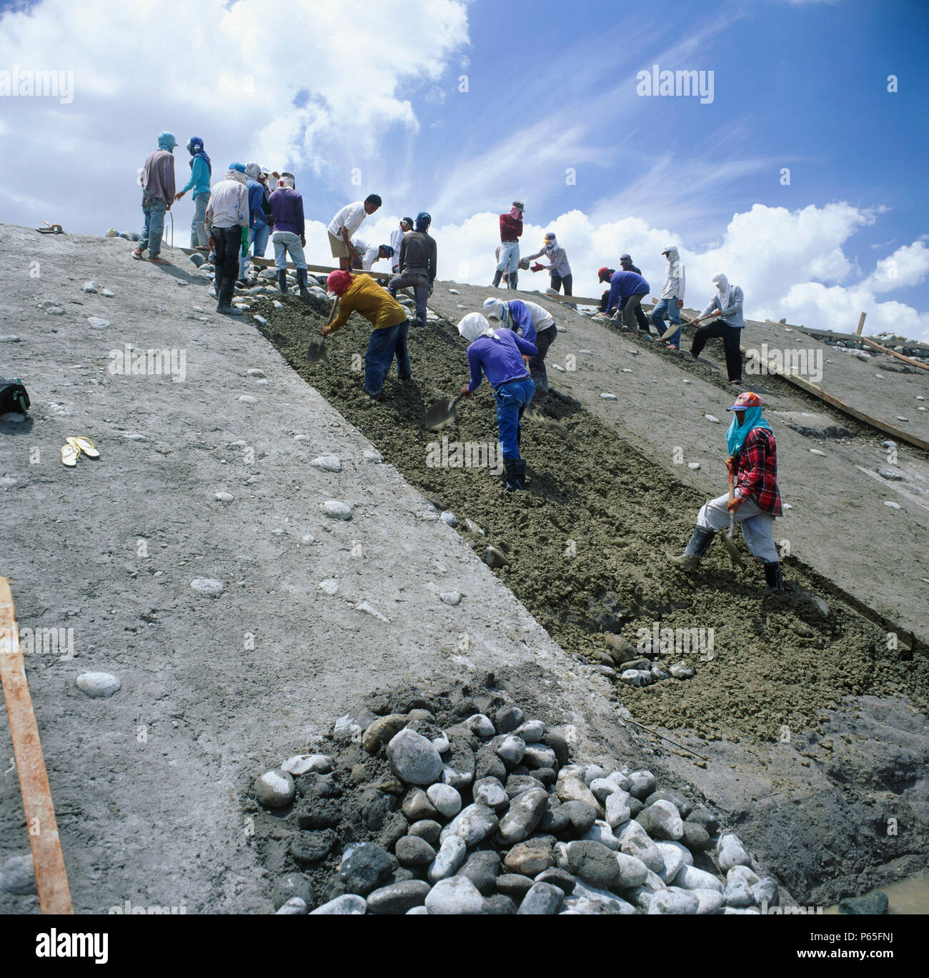 Pebble enhanced concrete facing for embankments along a new emergency water drainage channel through volcanic ash thrown out by Mount Pinatuba in the  Stock Photo
