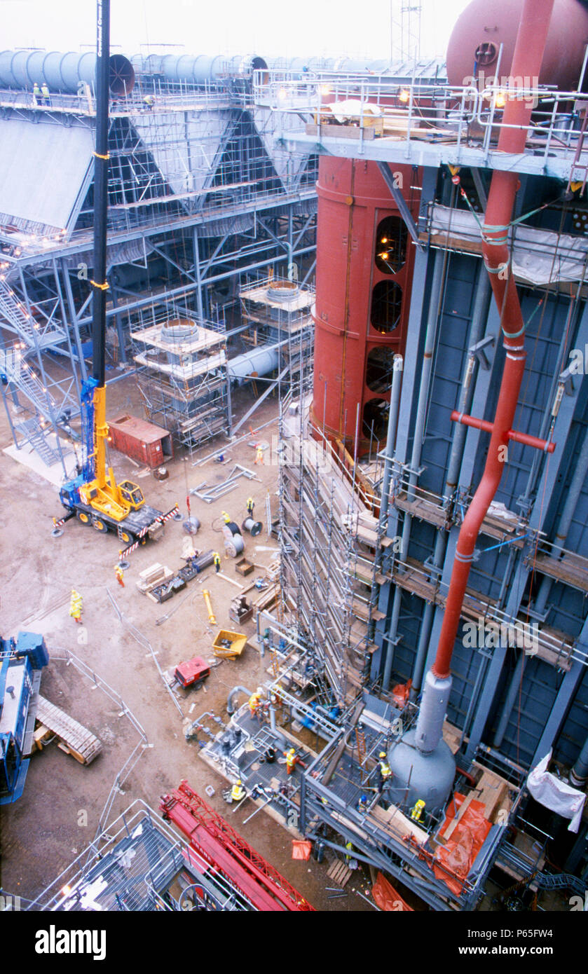 View past huge heat exchanger unit to new style peak roof coolers on the Spalding gas-fed power station in East Anglia Stock Photo