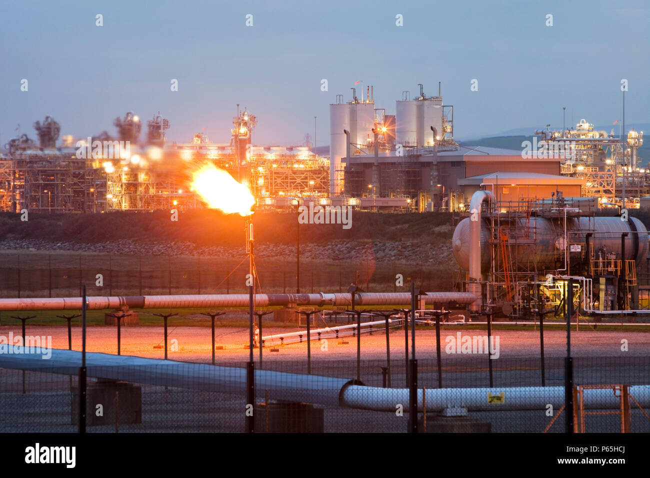 Gas being flared off at Centrica's gas plant in Barrow in Furness. This plant processes gas from the Morecambe bay gas field, Cumbria, UK. Stock Photo