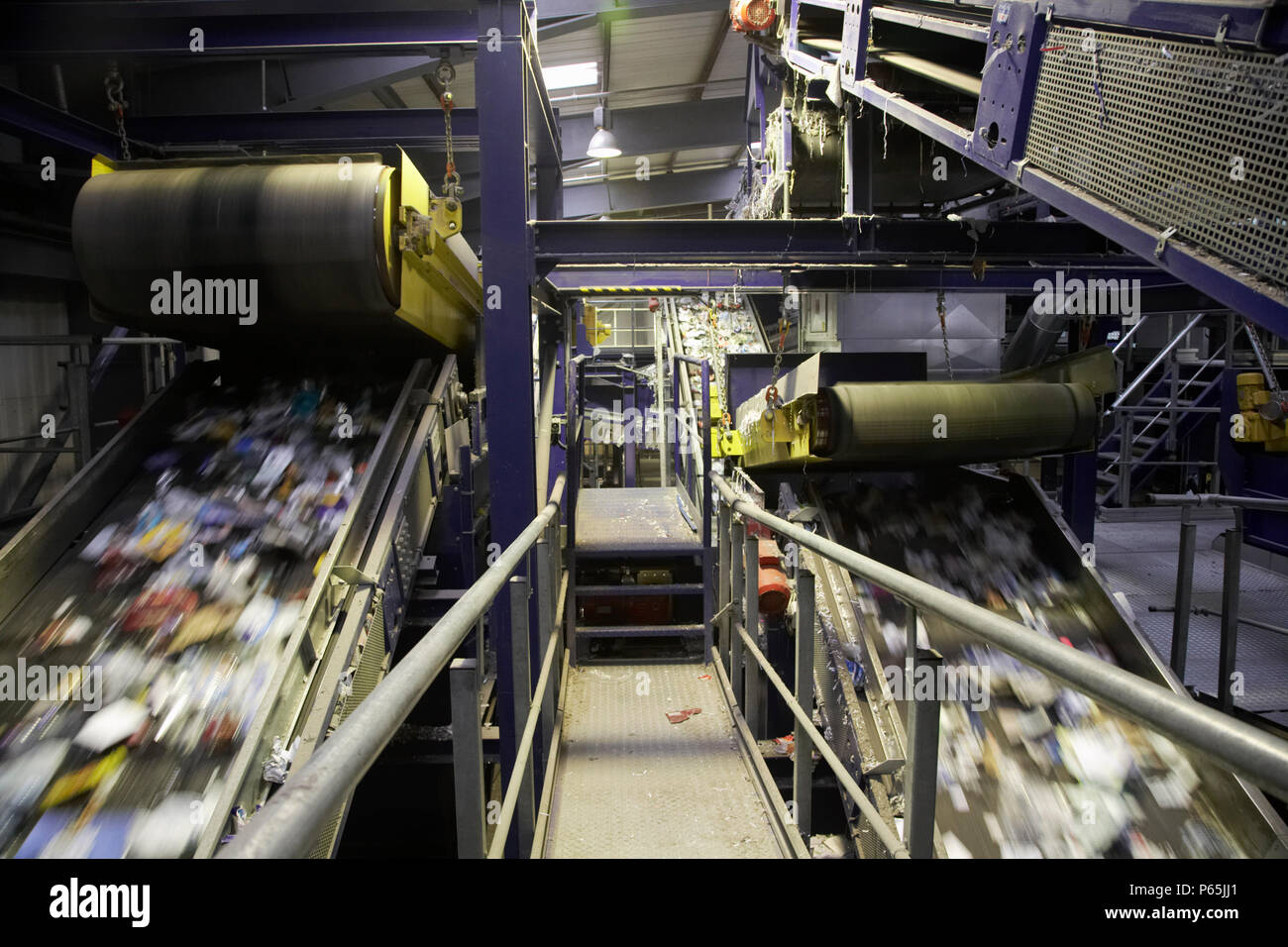 Recycling on conveyor belts in recycling plant Stock Photo Alamy