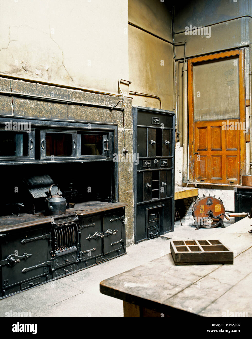 Old kitchen in an English mansion in renovation process. Stock Photo