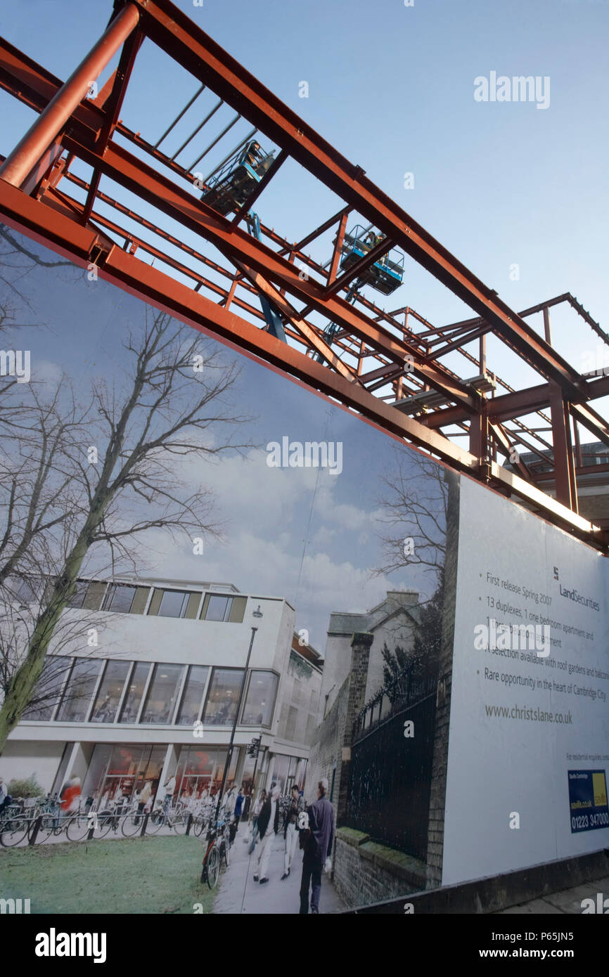 Hoarding surrounding a property development Stock Photo - Alamy