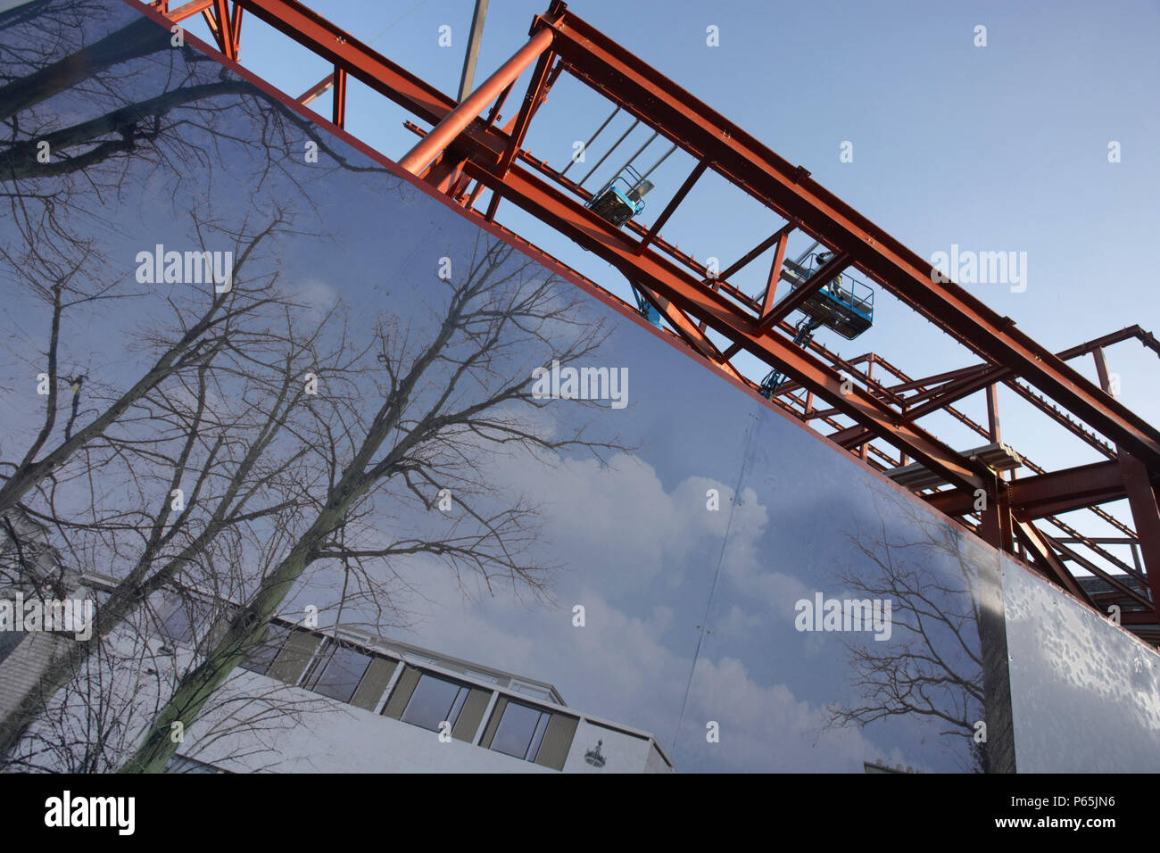 Hoarding surrounding a property development Stock Photo - Alamy