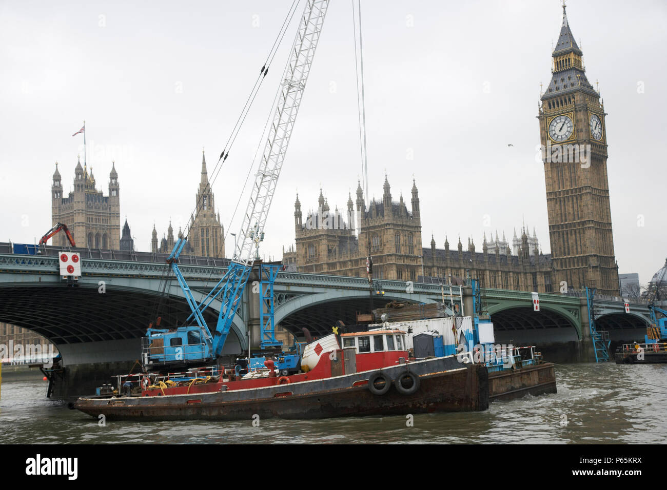 Crane barge on River thames next to Westminster Bridge, London, UK Stock Photo