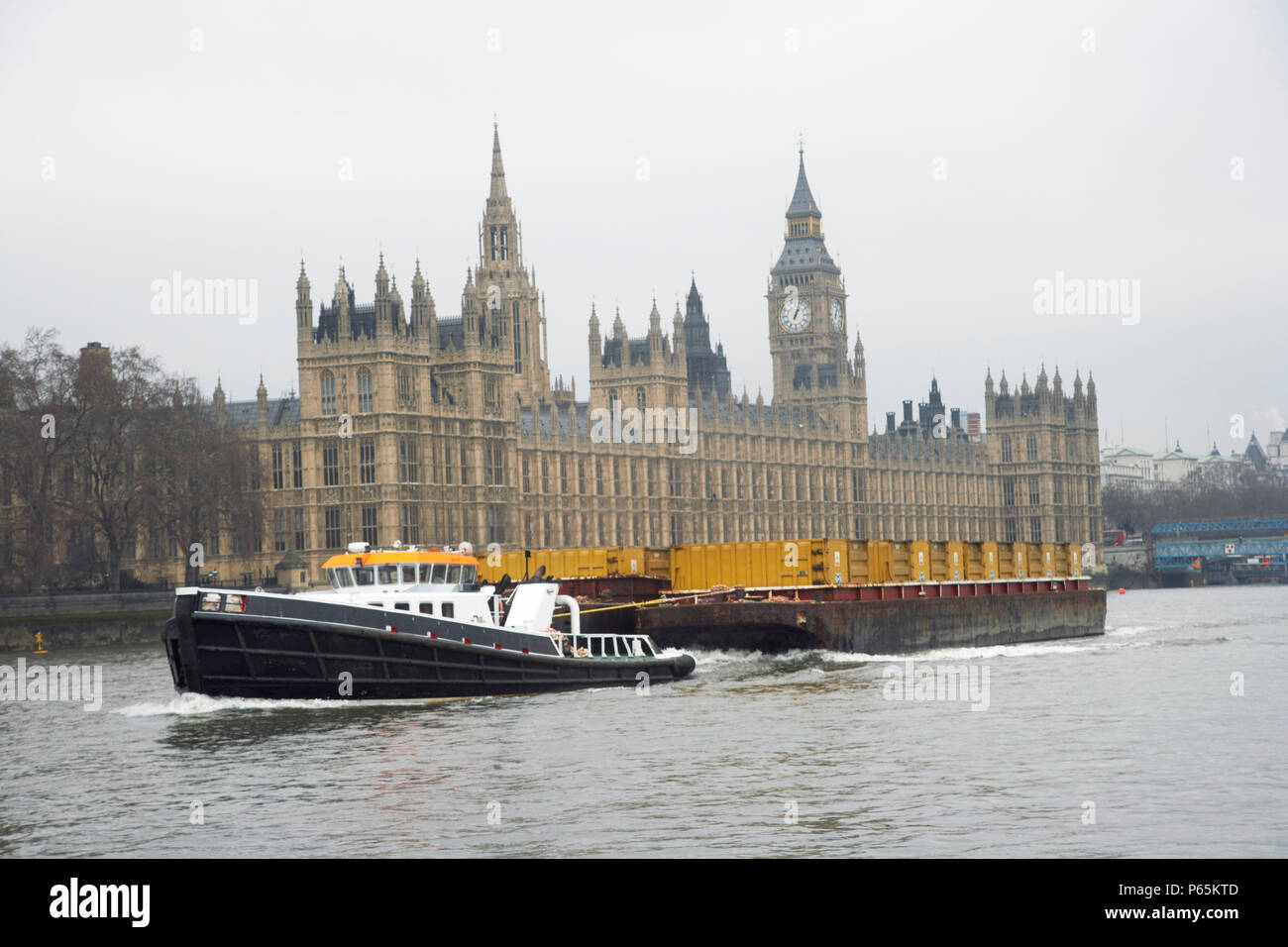 Container barge on River Thames, London, UK Stock Photo