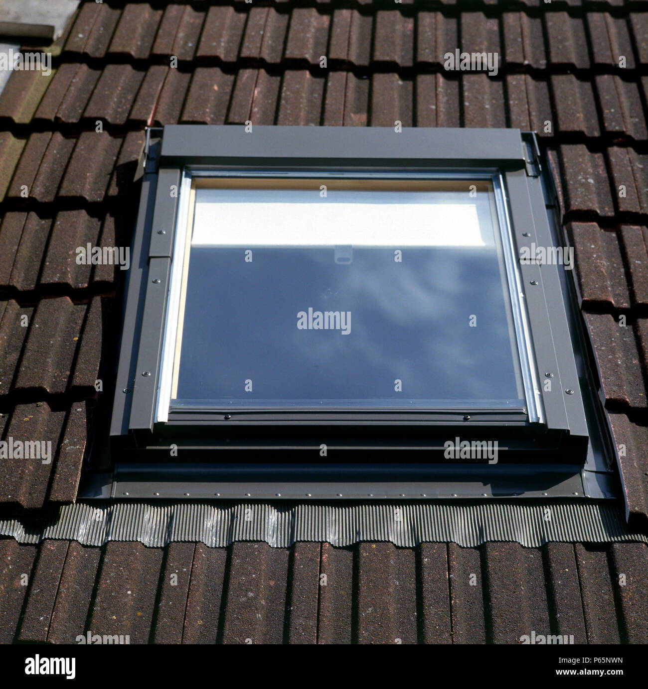 Loft conversion. Velux window installed in the attic Stock Photo Alamy