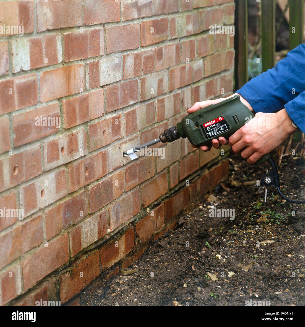 damp course applied to an external wall Stock Photo Alamy