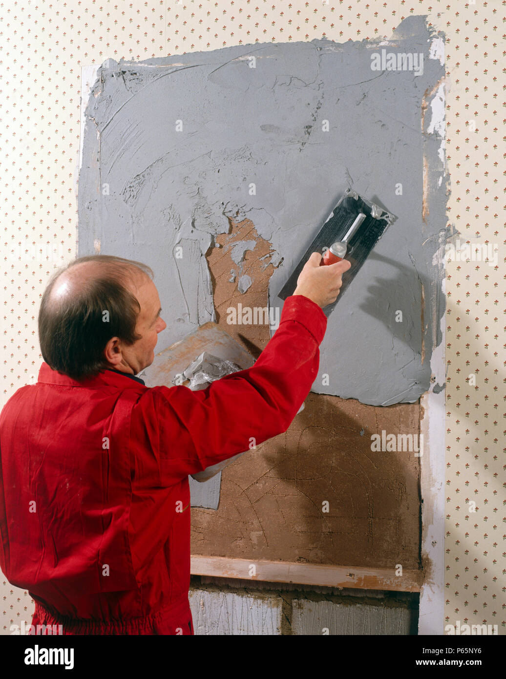 Rendering inside wall with a cement based plaster. Stock Photo