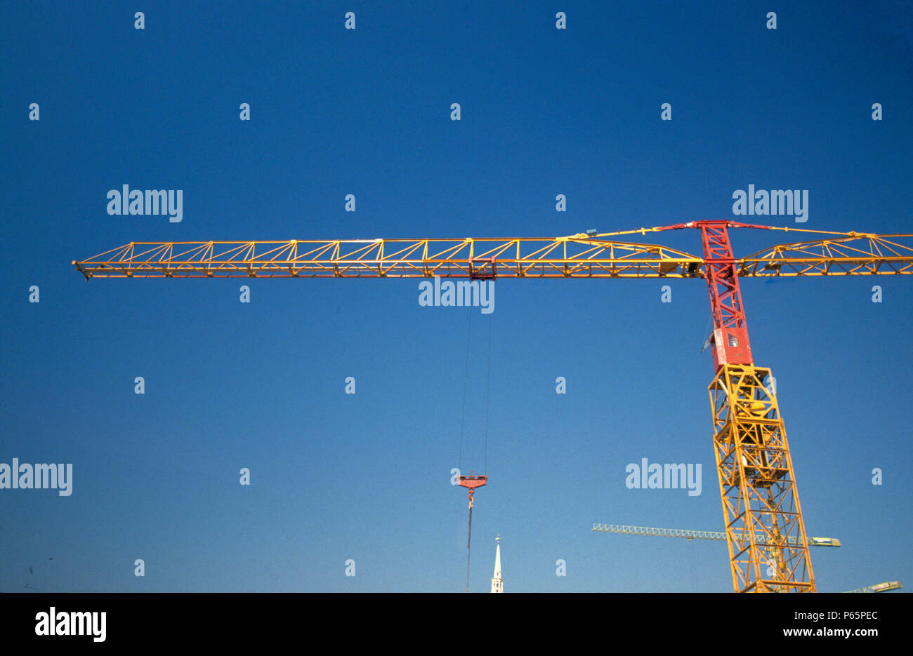 Tower crane on deep blue sky Stock Photo