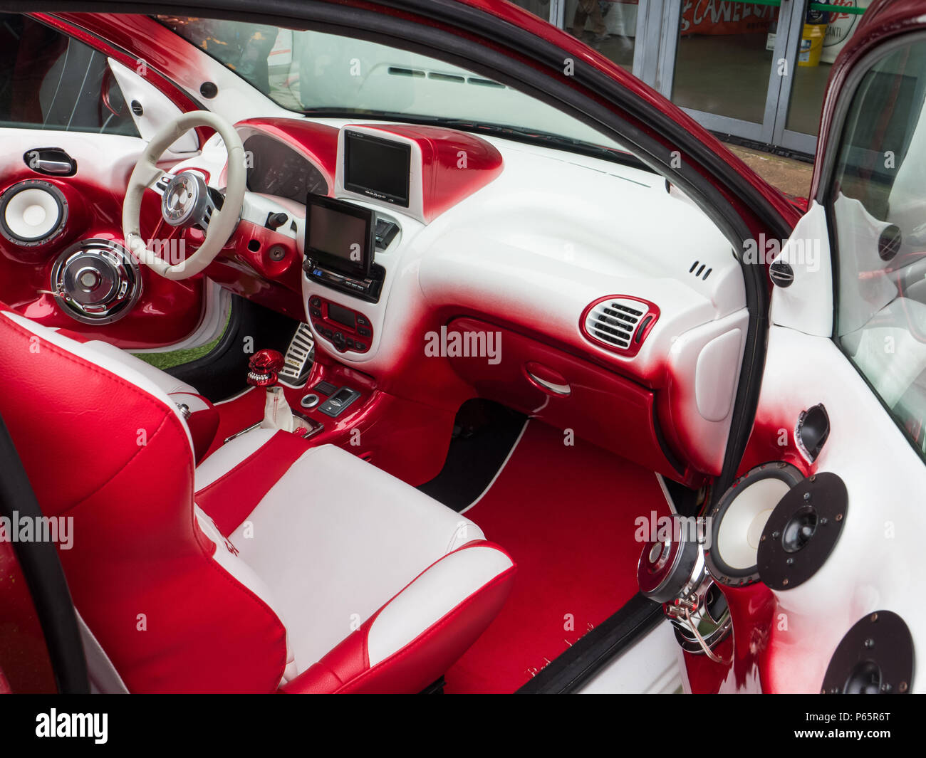 White And Red Sports Car With Leather Interior And A