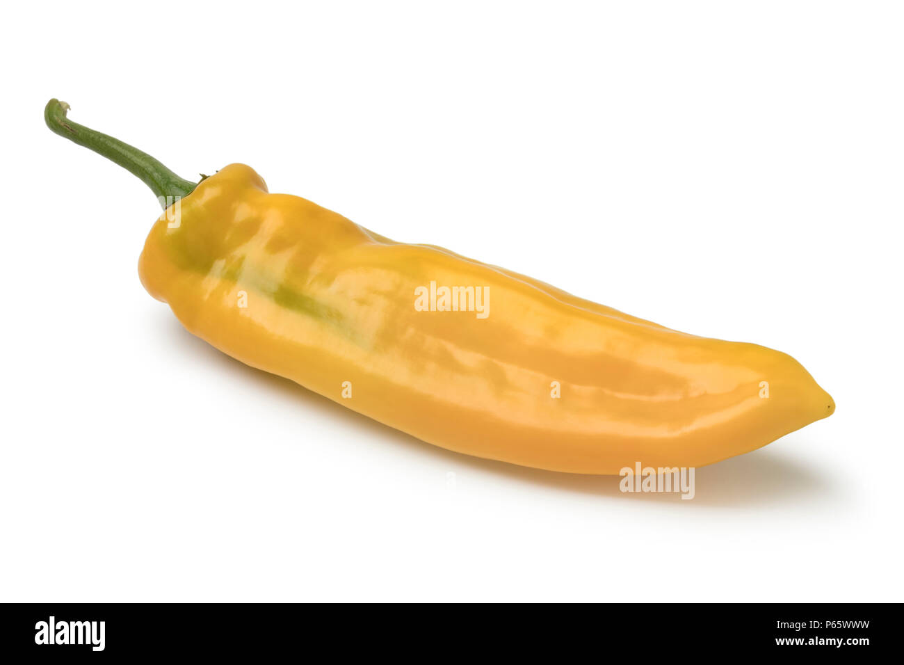 Single fresh yellow pointed pepper isolated on white background Stock Photo