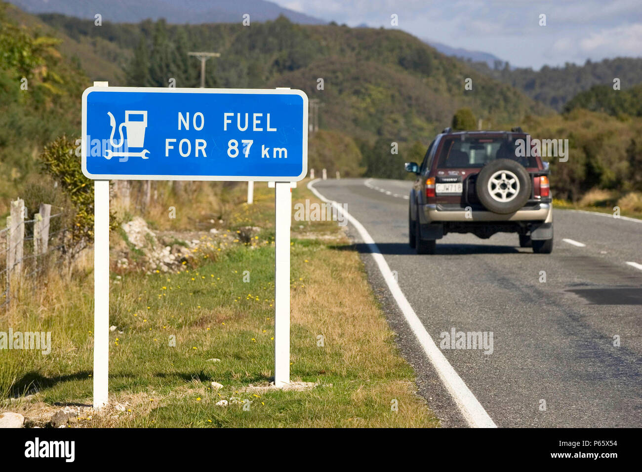 New Zealand: traffic sign, no petrol station for the next 87 kilometers. Stock Photo