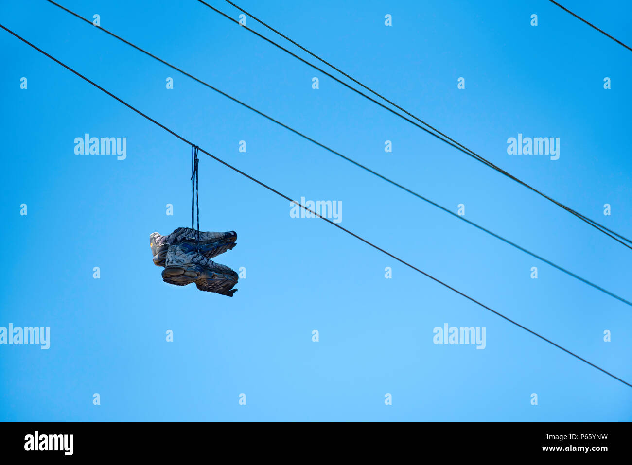 shoes tied to power lines