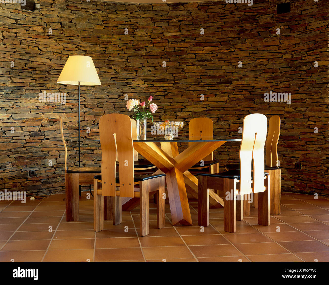 View Of A Dining Table Beside A Stonewall Stock Photo Alamy