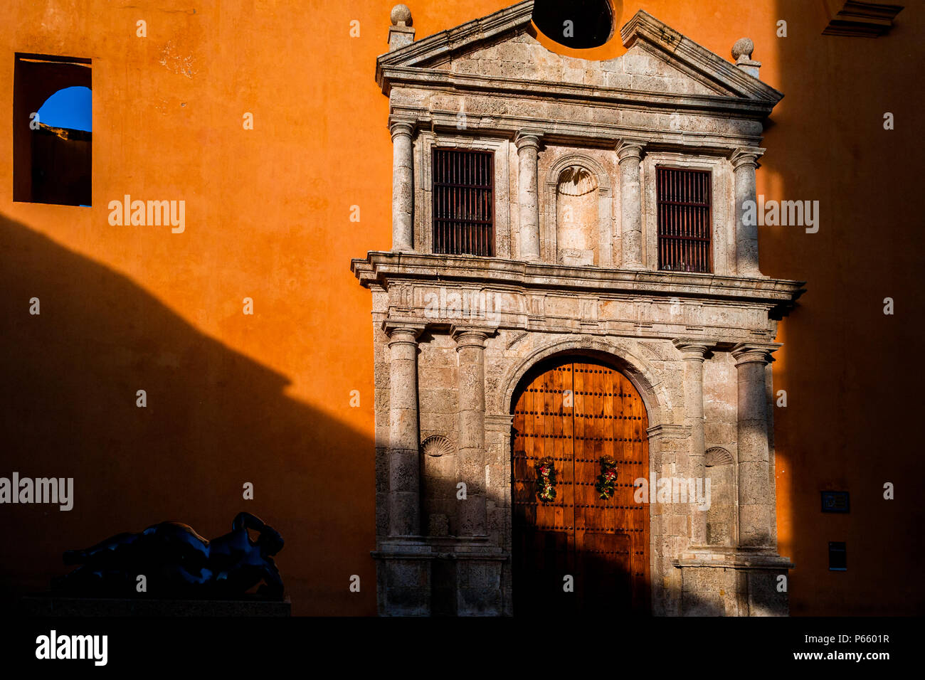 The church of Convento de Santo Domingo is seen rising out of the shadow during the sunny morning in Cartagena, Colombia. Stock Photo