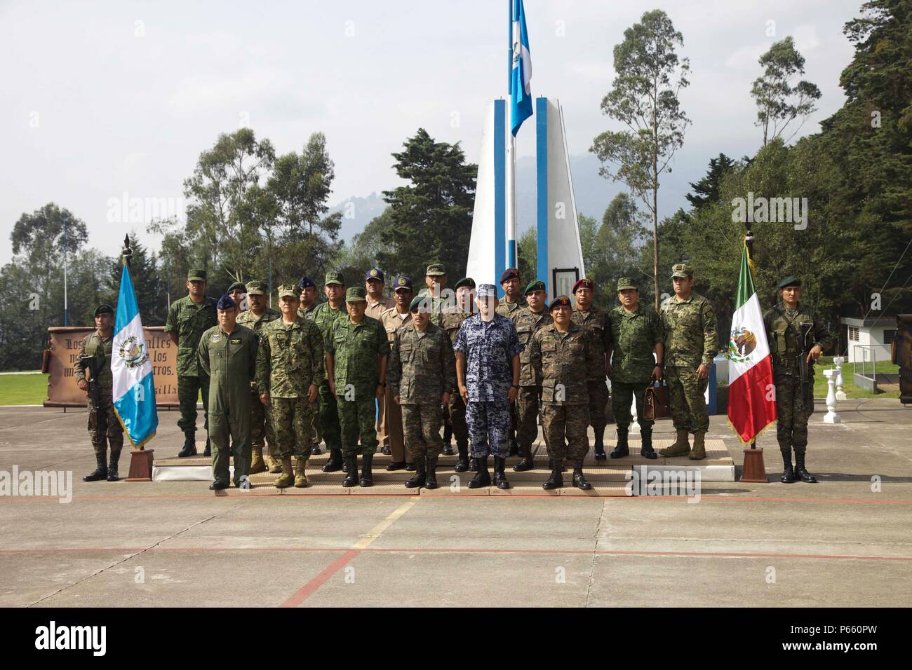 Joint Guatemalan and Mexican Military members meets for a Cinco De Mayo celebration during the Beyond The Horizon Operation at San Marcos, Guatemala, May 05, 2016. Task Force Red Wolf and Army South conducts Humanitarian Civil Assistance Training to include tactical level construction projects and Medical Readiness Training Exercises providing medical access and building schools in Guatemala with the Guatemalan Government and non-government agencies from 05MAR16 to 18JUN16 in order to improve the mission readiness of US forces and to provide a lasting benefit to the people of Guatemala. (U.S.  Stock Photo