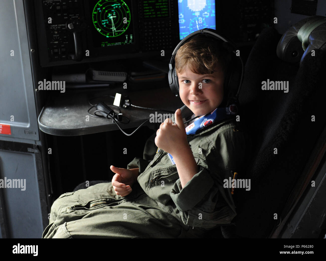 Jon Bryant “JB” Orso sits aboard a WC-130J Super Hercules during the 403rd Wing’s first Pilot for a Day event April 26, 2016, Keesler Air Force Base, Miss. Orso, who served as an honorary Air Force Reserve second lieutenant, is in remission after receiving treatment for Acute Lymphoblastic Leukemia. Pilot for a Day is a community outreach program for children who live with a chronic or life-threatening disease or illness. (U.S. Air Force photo by Kemberly Groue) Stock Photo