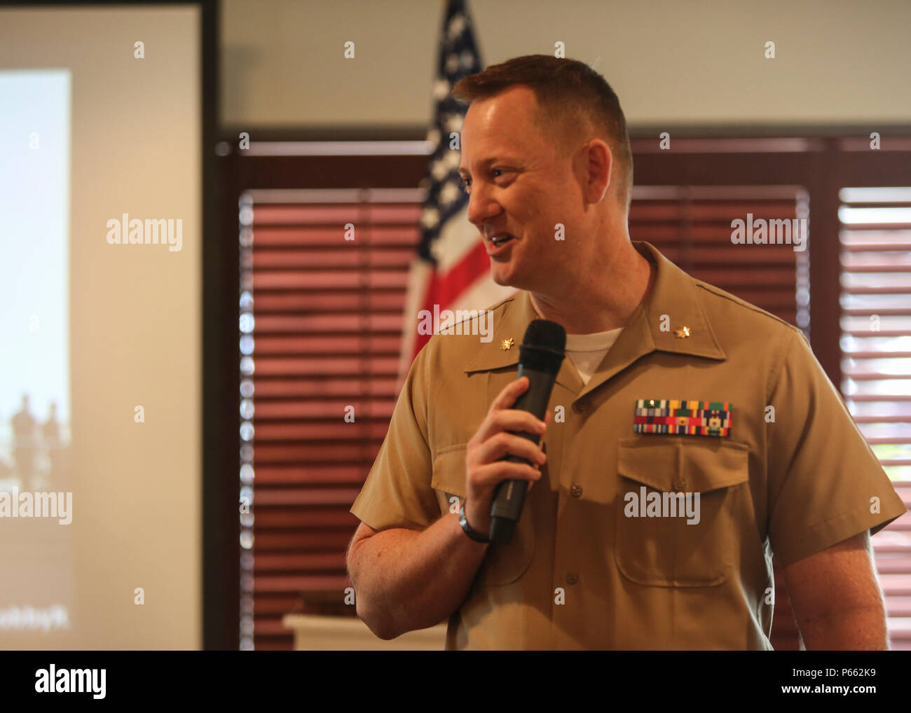Maj. Andre LaTaste, the Marine Forces Command programing officer, speaks to the Port Everglades Association during a Fleet Week luncheon, May 6, 2016. Fleet Week, which takes place in Fort Lauderdale, Fla., from May 2-8, will give the community of South Florida the opportunity to interact with the Marines and Sailors of the ship as well as see up-close and personal some of the capabilities and equipment the Marine Corps employs. (U.S. Marine Corps photo by Cpl. Michelle Reif/Released.) Stock Photo