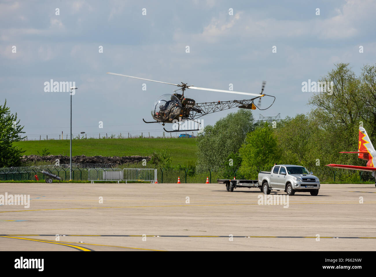 BERLIN, GERMANY - APRIL 27, 2018: Takeoff multipurpose light helicopter Bell 47. Exhibition ILA Berlin Air Show 2018 Stock Photo