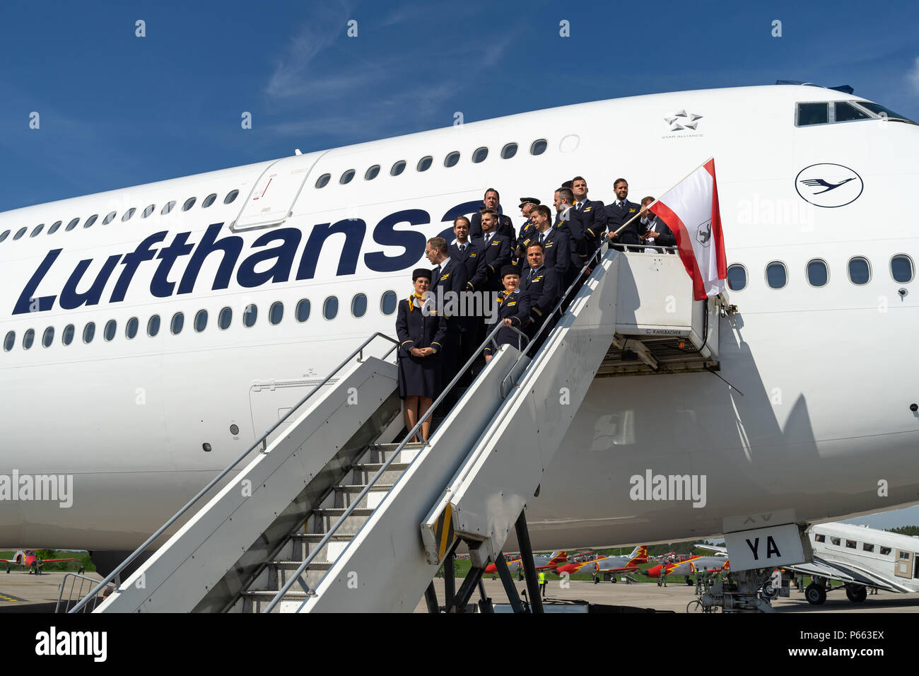 BERLIN - APRIL 28, 2018: The crew of widebody jet airliner Boeing 747-8. Lufthansa. Exhibition ILA Berlin Air Show 2018. Stock Photo