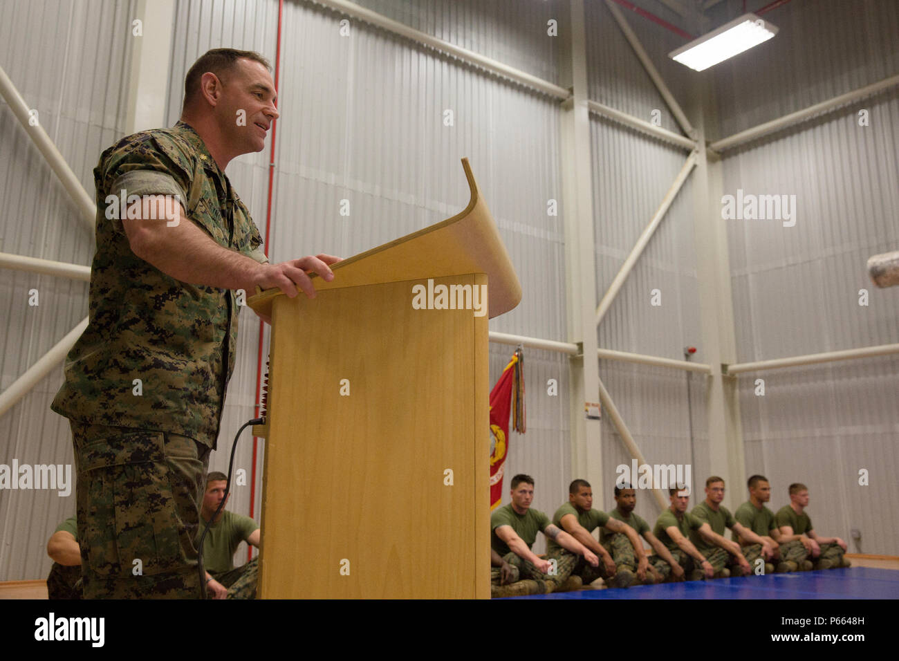 U.S. Marine Corps Maj. Christopher M. Reynolds, the executive officer of Black Sea Rotational Force, gives his remarks during the first Marine Corps Martial Arts Instructor Course held for BSRF 16.1 aboard Mihail Kognalniceanu Air Base, Romania, April 22, 2016. These graduates spent three weeks enduring physical training sessions, learning how to correctly give hip-pocket classes, and how to properly teach techniques of all belt levels of the Marine Corps Martial-Arts Program. (U.S. Marine Corps photo by Cpl. Kelly L. Street, 2D MARDIV COMCAM/Released) Stock Photo