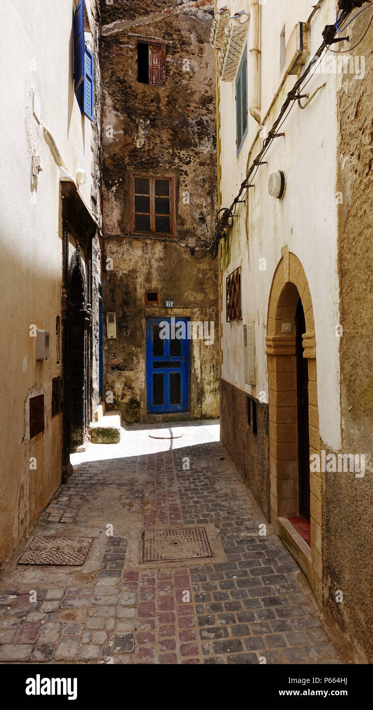 A quiet street in the ancient Moroccan town of Essaouira inside the Medina. Stock Photo