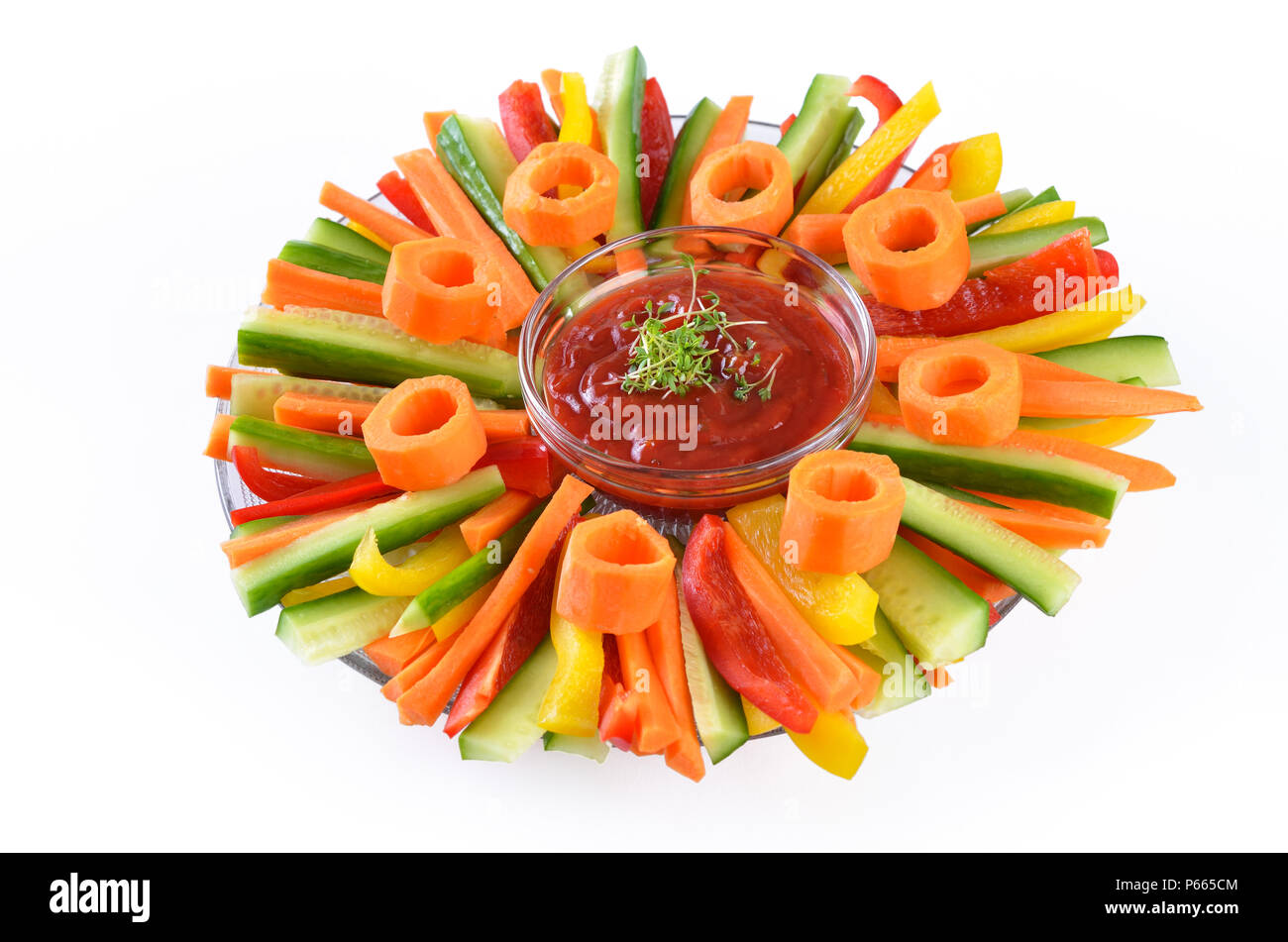 Fresh vegetable sticks with dip on a plate on white background Stock Photo  - Alamy