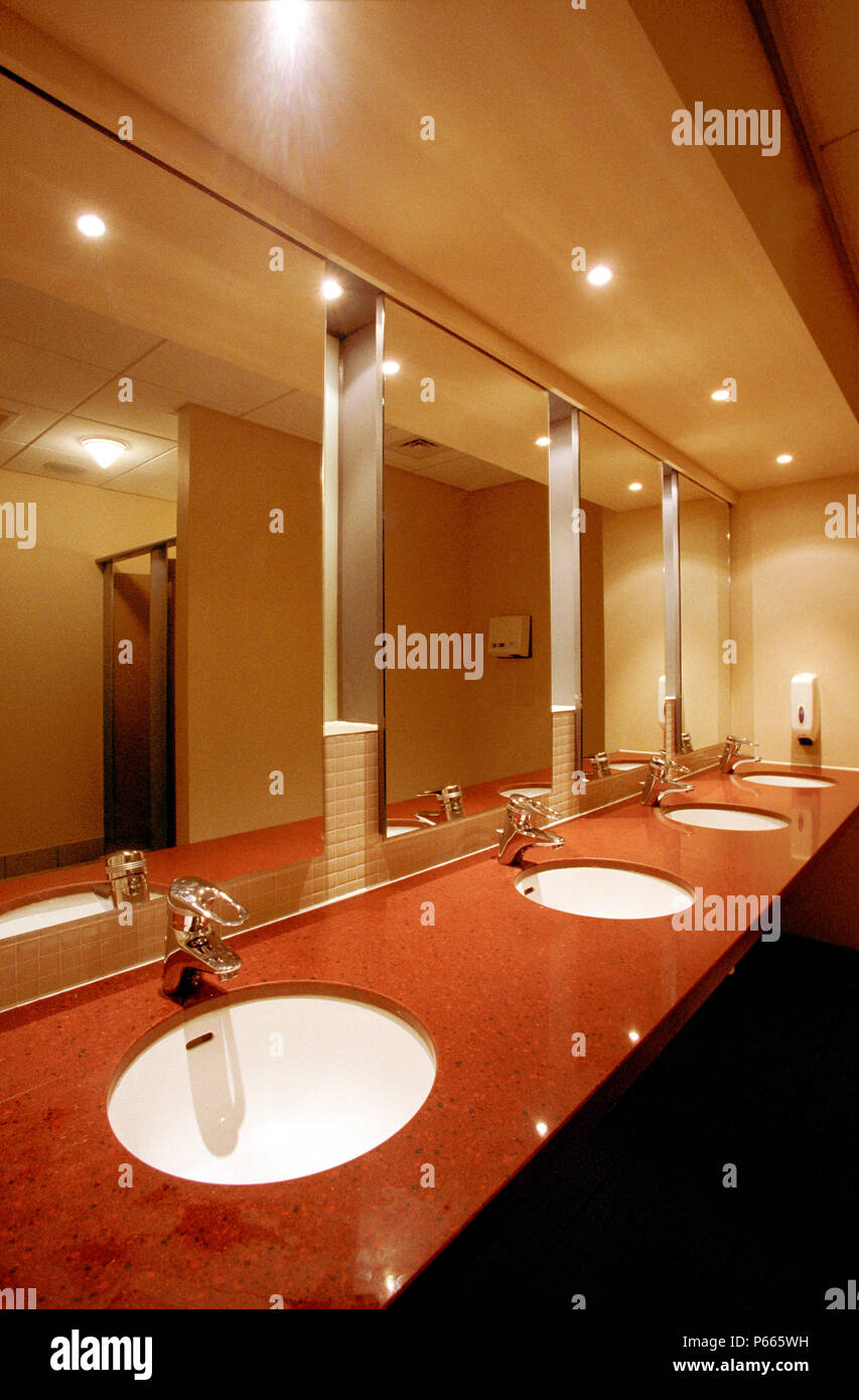 Interior of washrooms, showing marble surfaces and sinks. Stock Photo