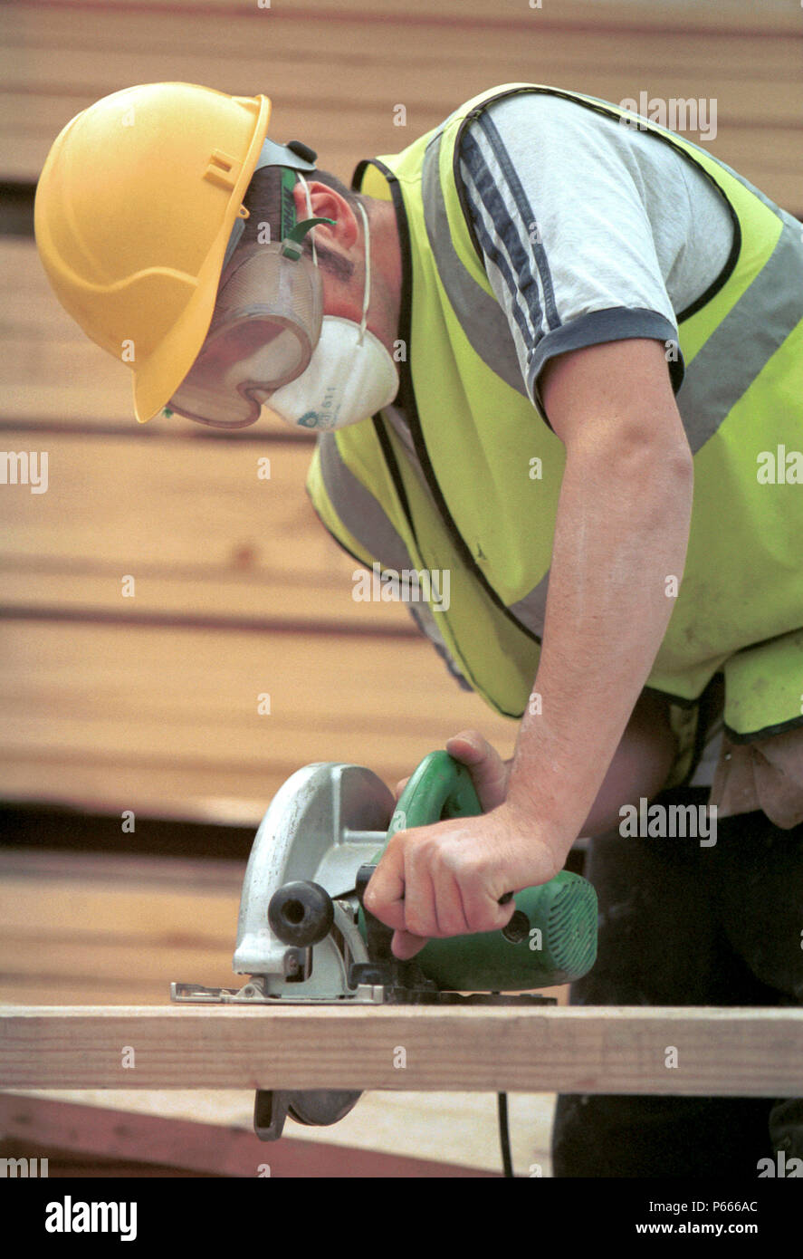 Carpentry joinery operating circular portable hires stock photography