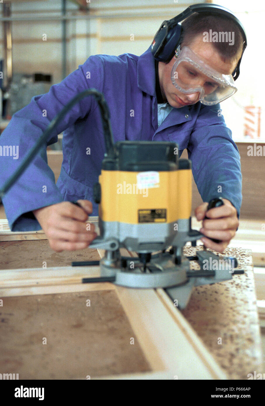 Bench Joinery. Using a router, portable power tool Stock Photo Alamy