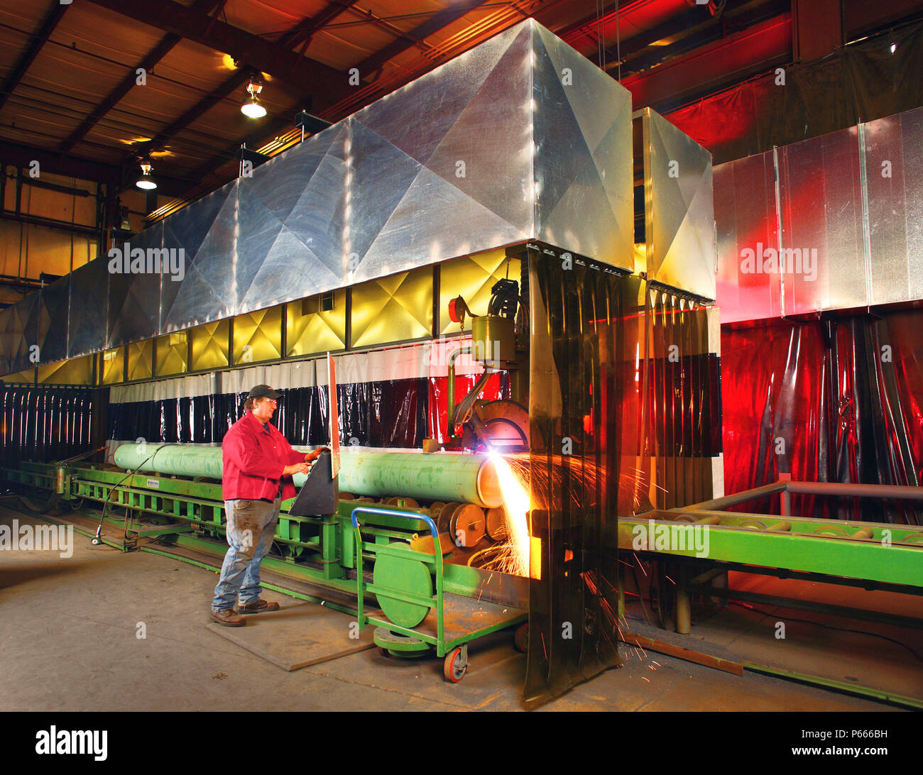 Cutting pipe at steel fabricators Stock Photo