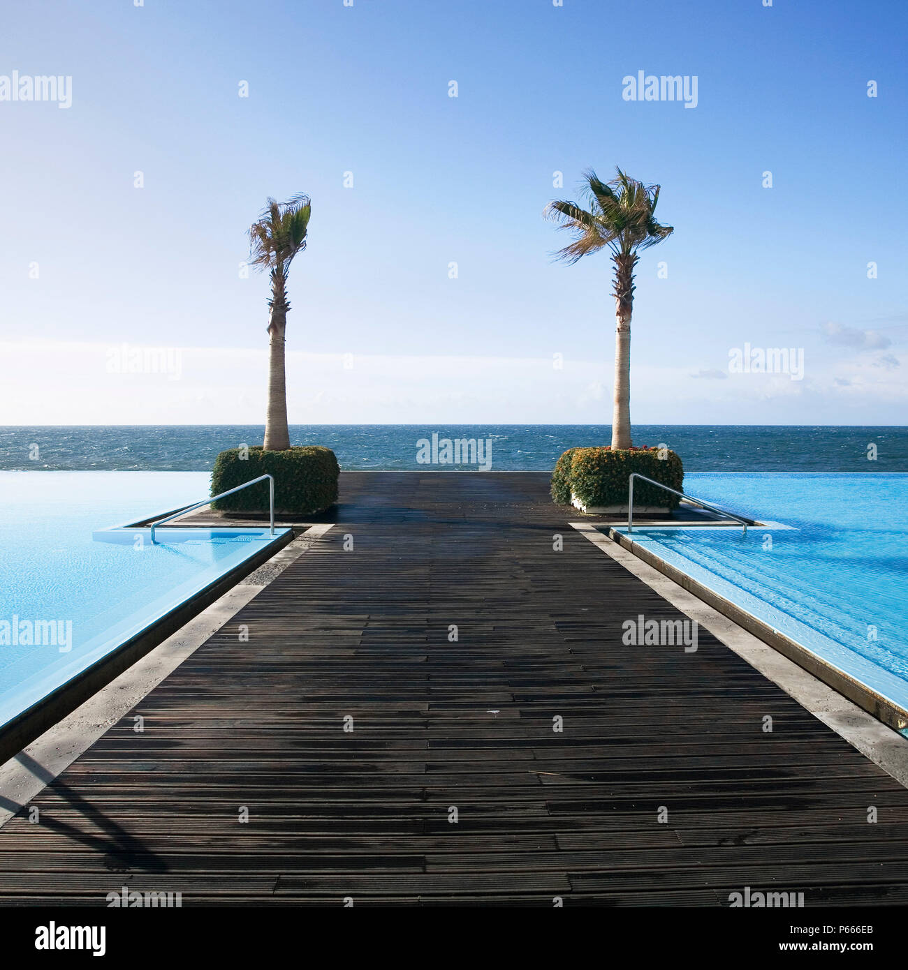 Boardwalk at the infinity pool at the CS Maderia Hotel, Madeira, Portugal Stock Photo