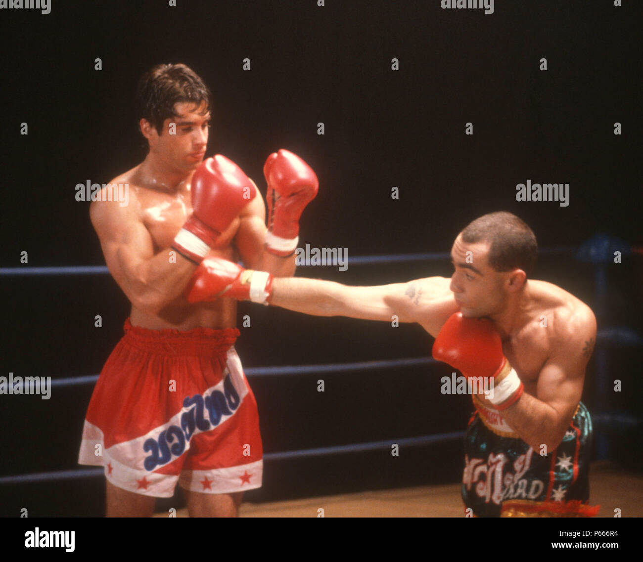 LOS ANGELES, CA - DECEMBER 7: (EXCLUSIVE) (L-R) Actor John Haymes Newton, aka John Newton and fighter Ronny Flas on set of 'Desert Kickboxer' on December 7, 1991 in Los Angeles, California. Photo by Barry King/Alamy Stock Photo Stock Photo