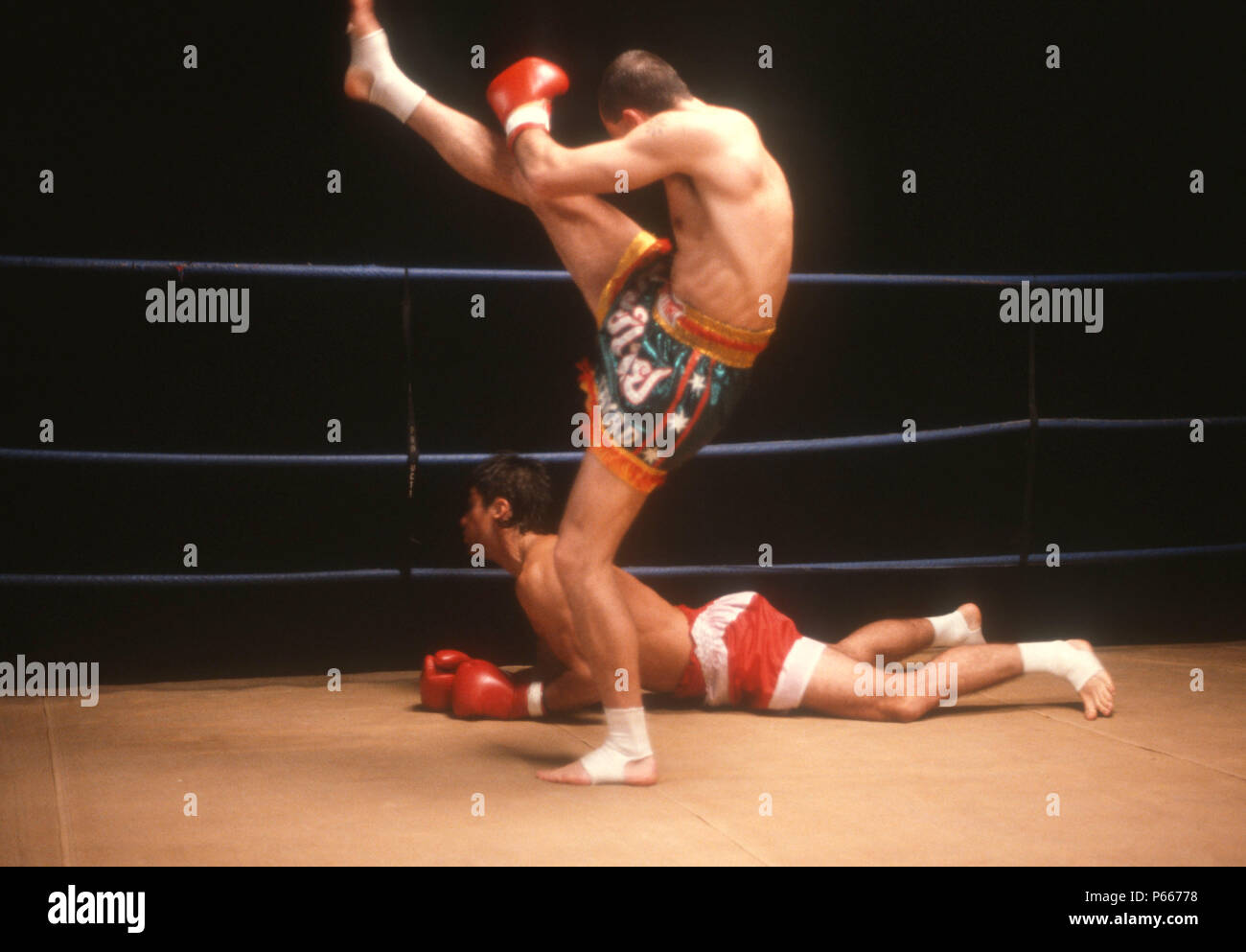 LOS ANGELES, CA - DECEMBER 7: (EXCLUSIVE) Actor John Haymes Newton, aka John Newton and fighter Ronny Flas on set of 'Desert Kickboxer' on December 7, 1991 in Los Angeles, California. Photo by Barry King/Alamy Stock Photo Stock Photo