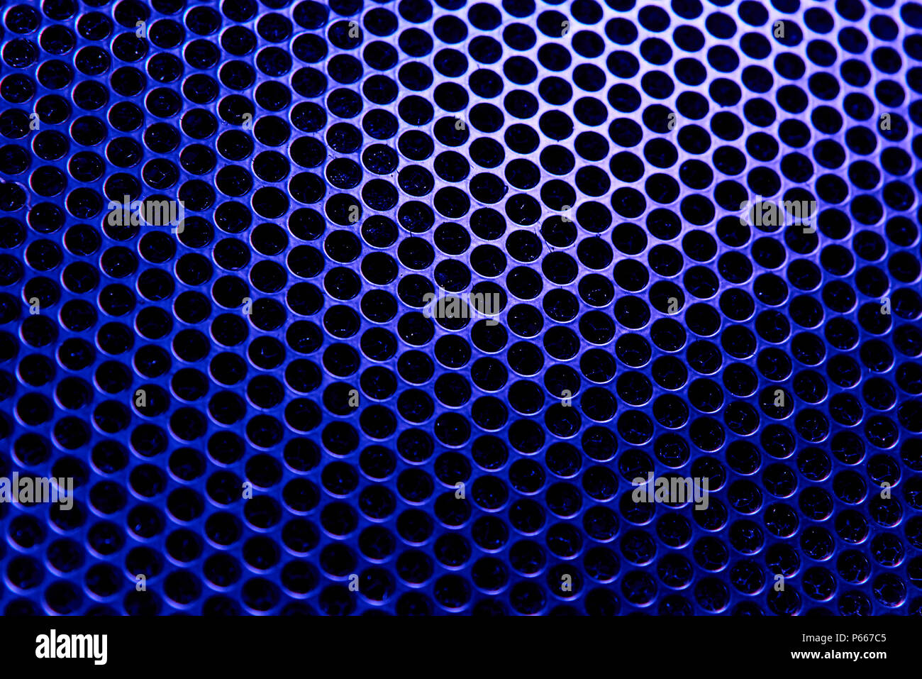Background texture of blue lattice in backlight. Stock Photo