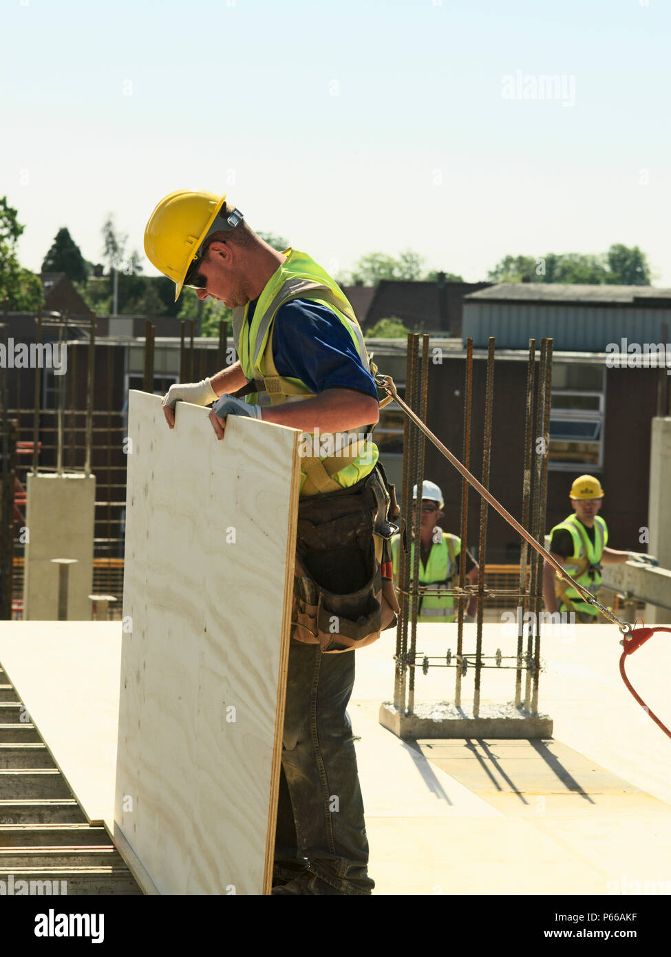 Man laying down wood panels Stock Photo Alamy