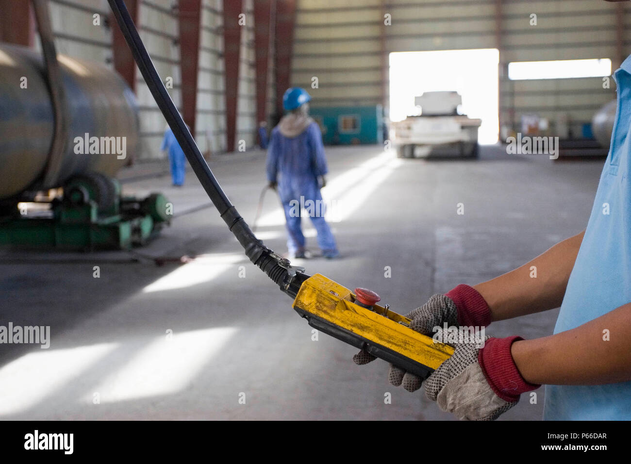 Workers at Hyojong Pipe factory, Doha. Stock Photo