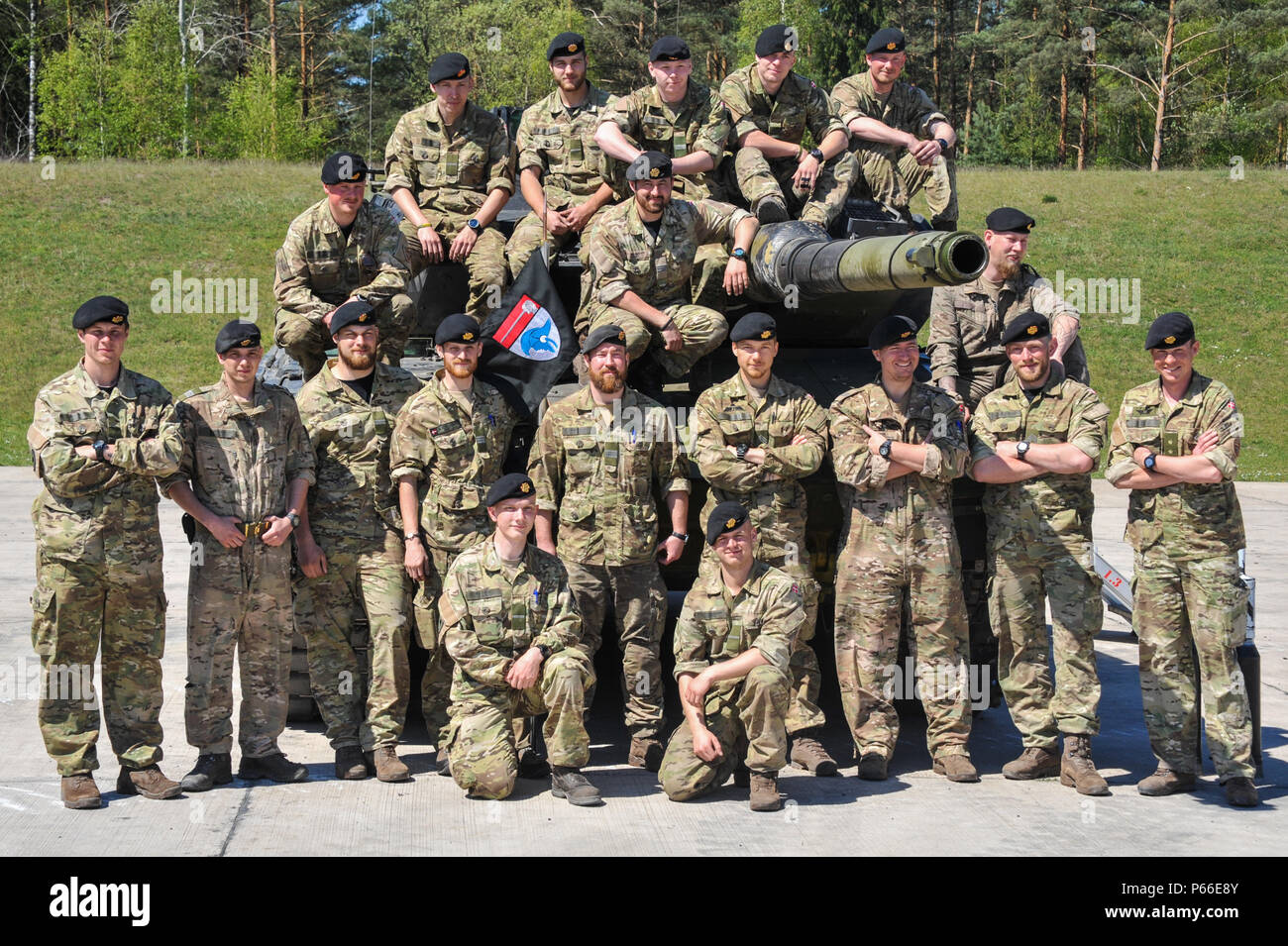 Soldiers from Denmark participating in the Strong Europe Tank Challenge (SETC) pose for a group photo May 08, 2016 at Grafenwoehr Training Area, Germany. The SETC is co-hosted by U.S. Army Europe and the German Bundeswehr May 10-13, 2016. The competition is designed to foster military partnership while promoting NATO interoperability. Seven platoons from six NATO nations are competing in SETC - the first multinational tank challenge at Grafenwoehr in 25 years. For more photos, videos and stories from the Strong Europe Tank Challenge, go to http://www.eur.army.mil/tankchallenge/ (U.S. Army phot Stock Photo