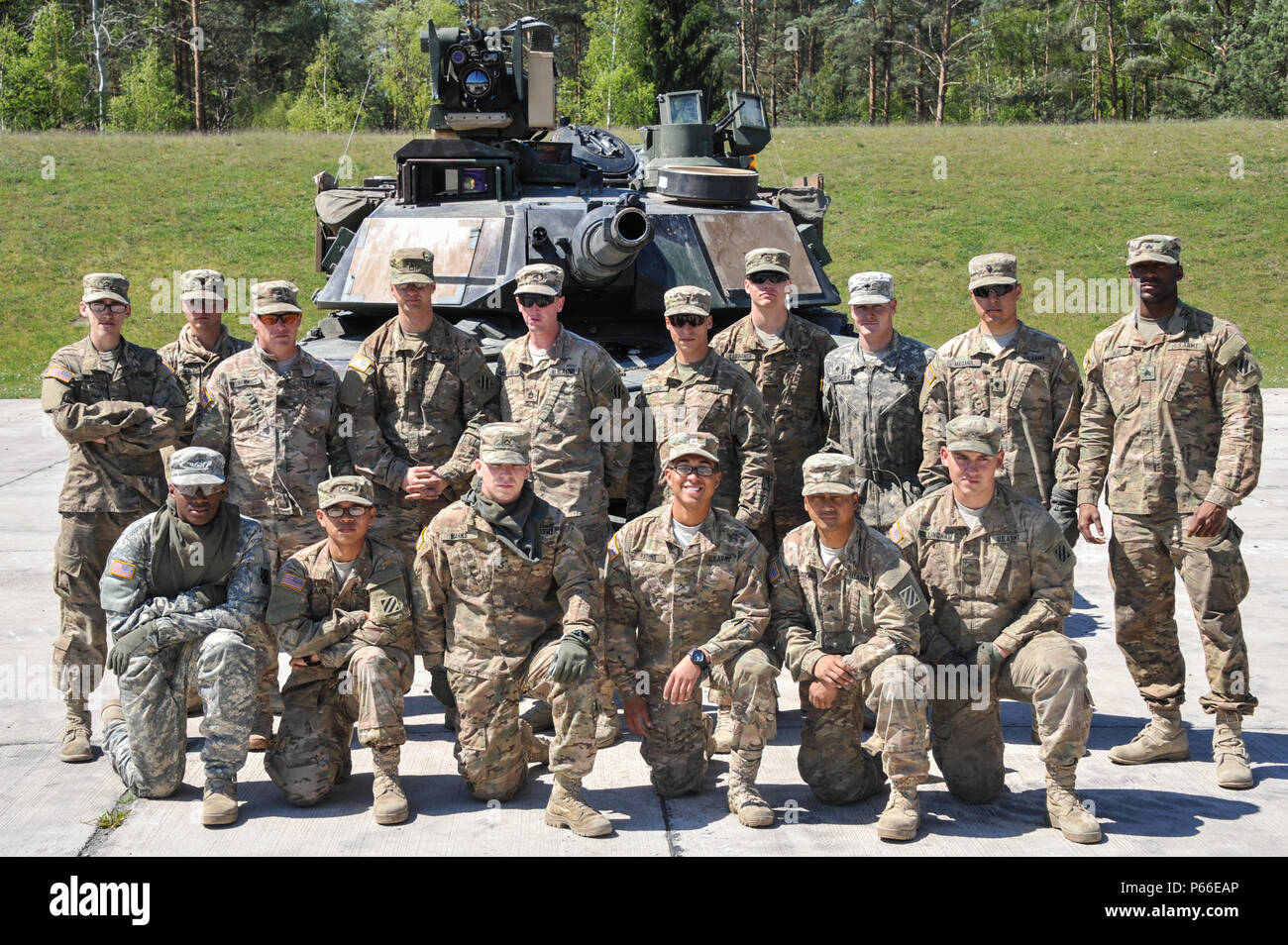 U.S. Soldiers with 3rd Infantry Division participating in the Strong Europe Tank Challenge (SETC) pose for a group photo May 08, 2016 at Grafenwoehr Training Area, Germany. The SETC is co-hosted by U.S. Army Europe and the German Bundeswehr May 10-13, 2016. The competition is designed to foster military partnership while promoting NATO interoperability. Seven platoons from six NATO nations are competing in SETC - the first multinational tank challenge at Grafenwoehr in 25 years. For more photos, videos and stories from the Strong Europe Tank Challenge, go to http://www.eur.army.mil/tankchallen Stock Photo