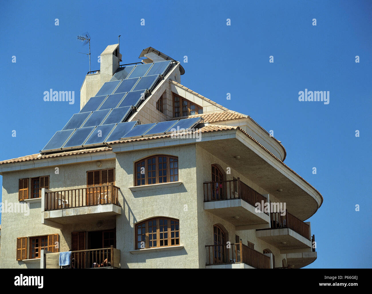 Solar Power, solar panels on roof to provide hot water Stock Photo