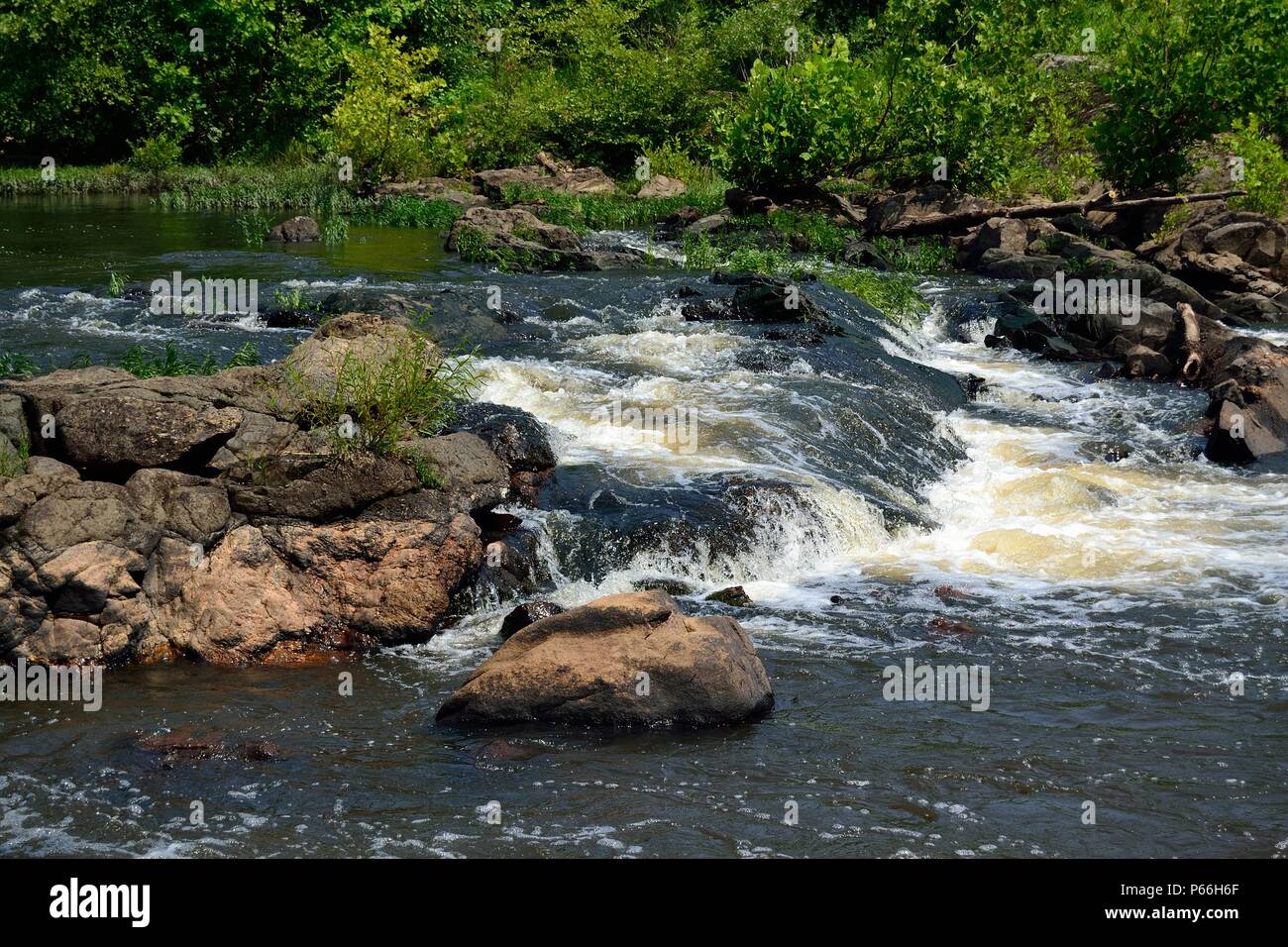 Rapids in Appomattox River, tributary of the James River, part of the