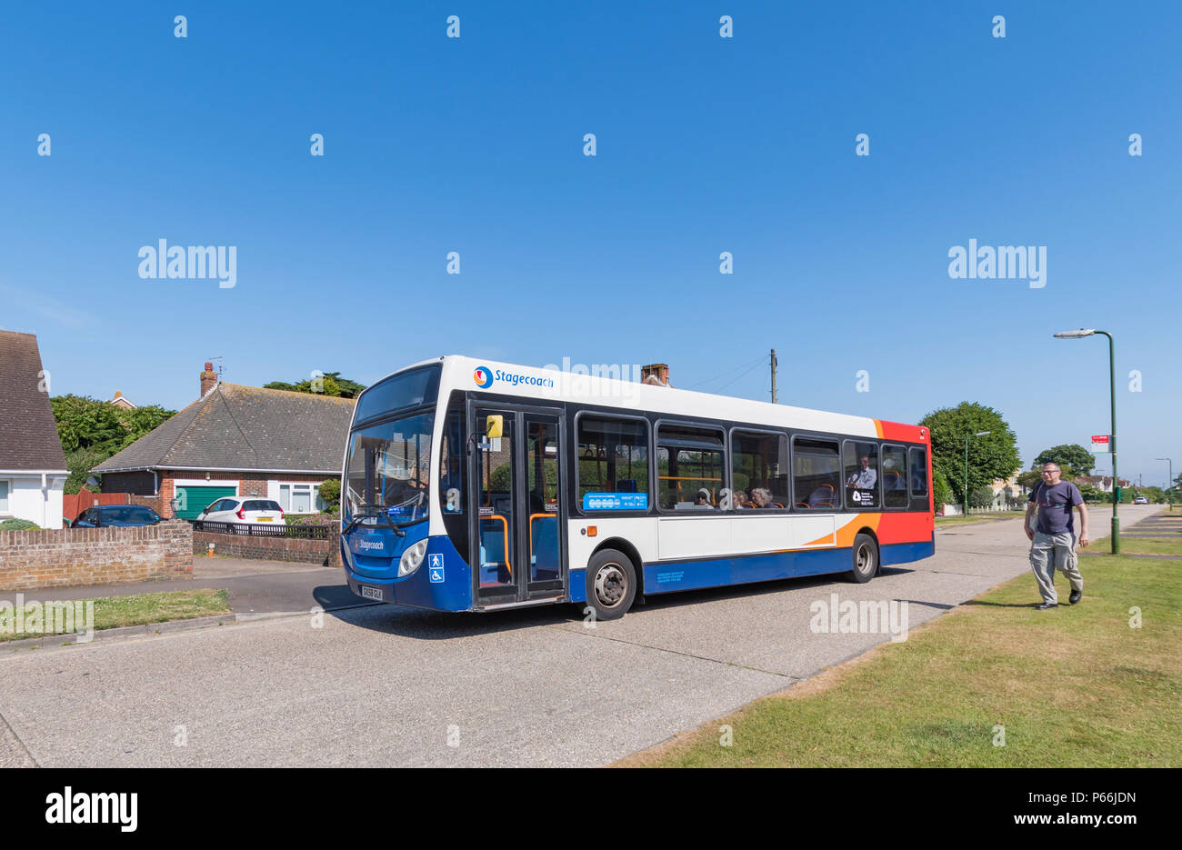 Number 9 Stagecoach single deck bus in a residential area in Rustington, West Sussex, England, UK. Stock Photo