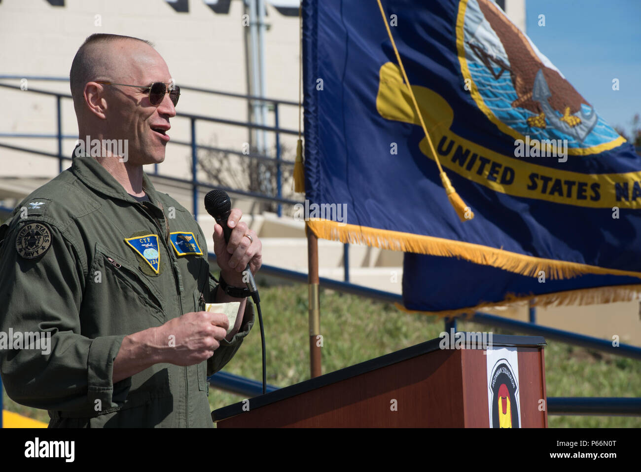 U.S. Navy Capt. Ed McCabe gives remarks during the VQ3 detachment