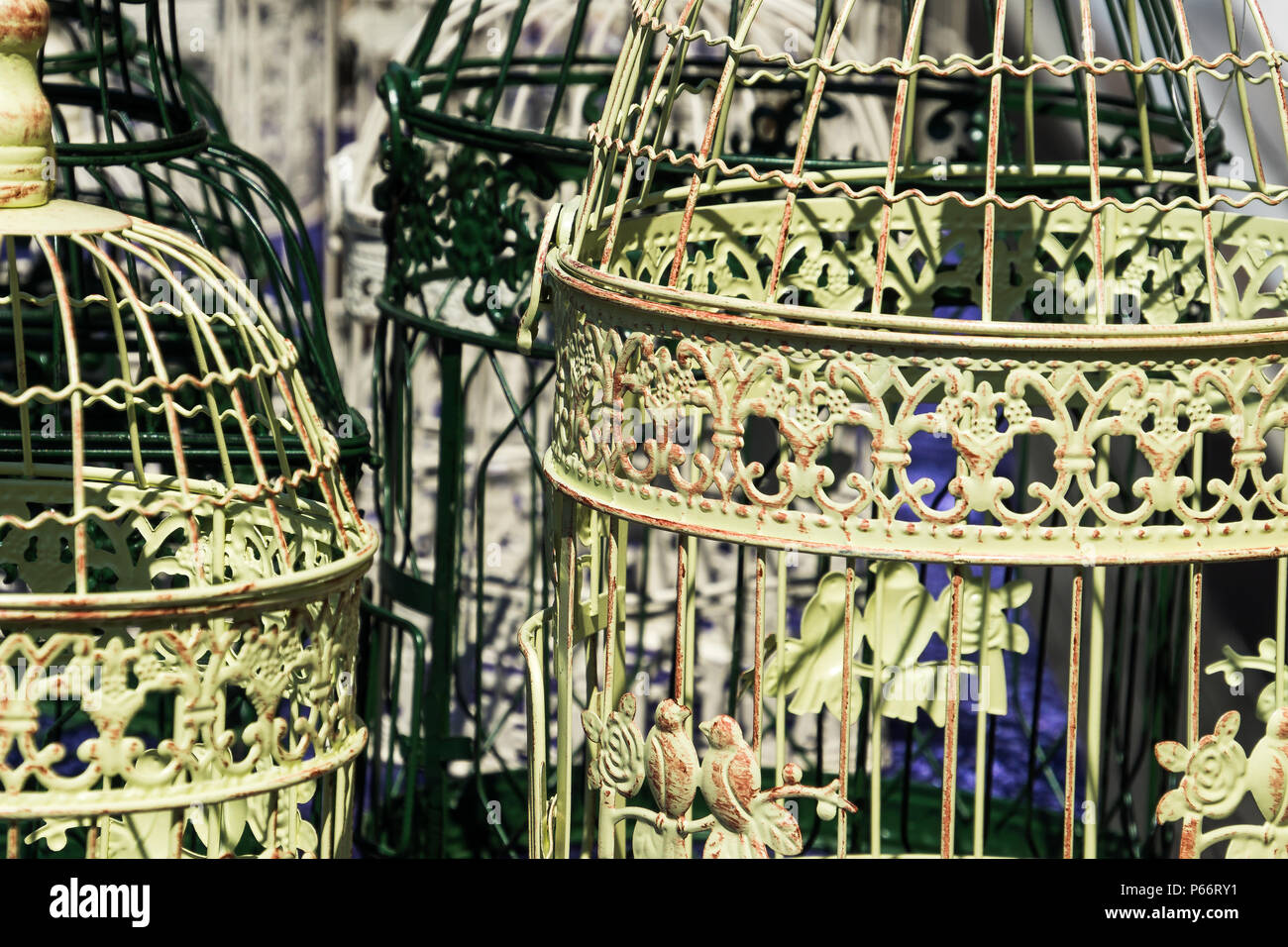 Antique bird cages decorated with ornaments at a flea market, Germany Stock  Photo - Alamy