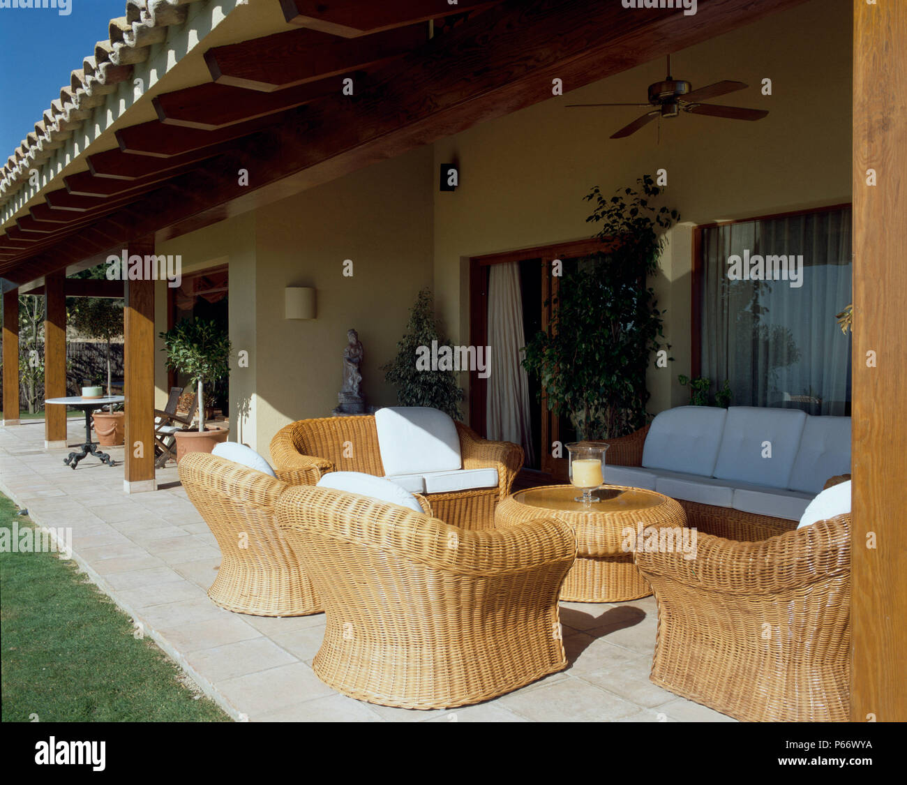 View of wicker chairs arranged in the lanai Stock Photo