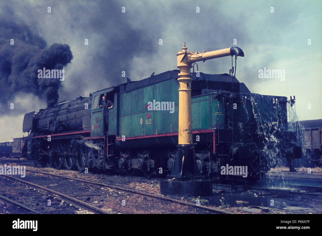 A Spanish Railways 5'6 gauge 2-4-2Fs arrives at Castejon with a box freight from Miranda on Wednesday 26th August 1970. Stock Photo